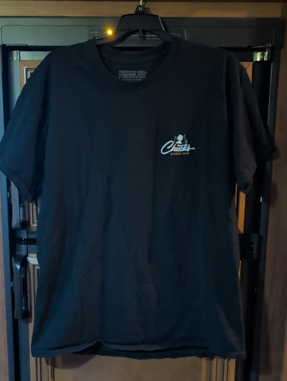 Peanuts Chuck's Barber Shop Black Short Sleeve Tee